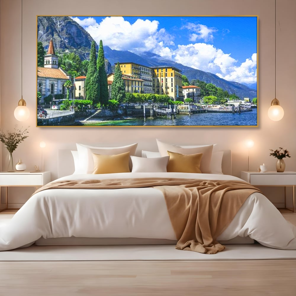 Tablou canvas cu peisaj urban pe malul lacului, in rama de aluminiu auriu, pe perete intr-un dormitor