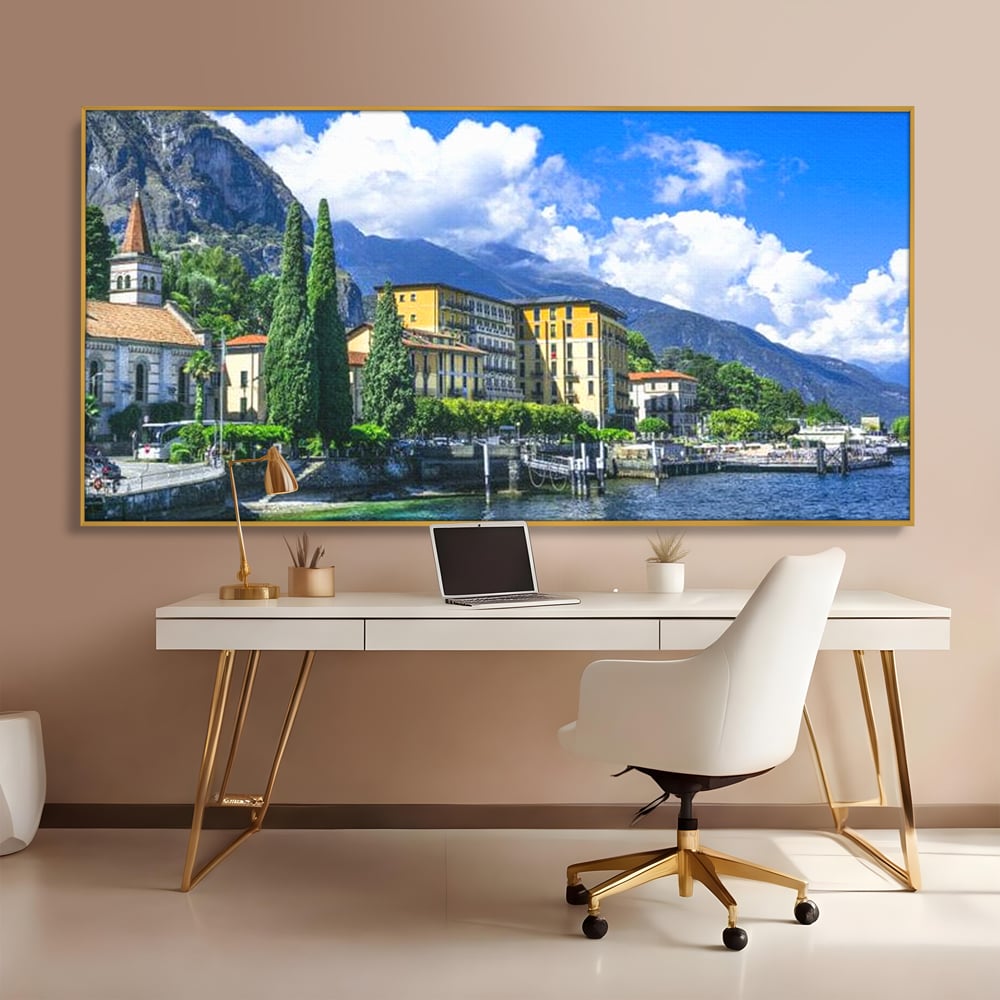 Tablou canvas cu peisaj urban pe malul lacului, in rama de aluminiu auriu, pe perete intr-un birou