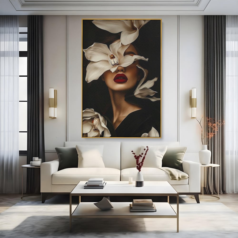 Tablou canvas cu tablou canvas cu femeie si orhidee, in rama de aluminiu auriu, pe perete intr-un living