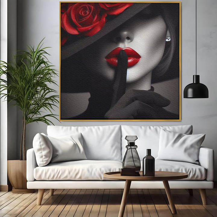 Tablou canvas cu tablou portret femeie cu trandafiri rosii, in rama de aluminiu auriu, pe perete intr-un living