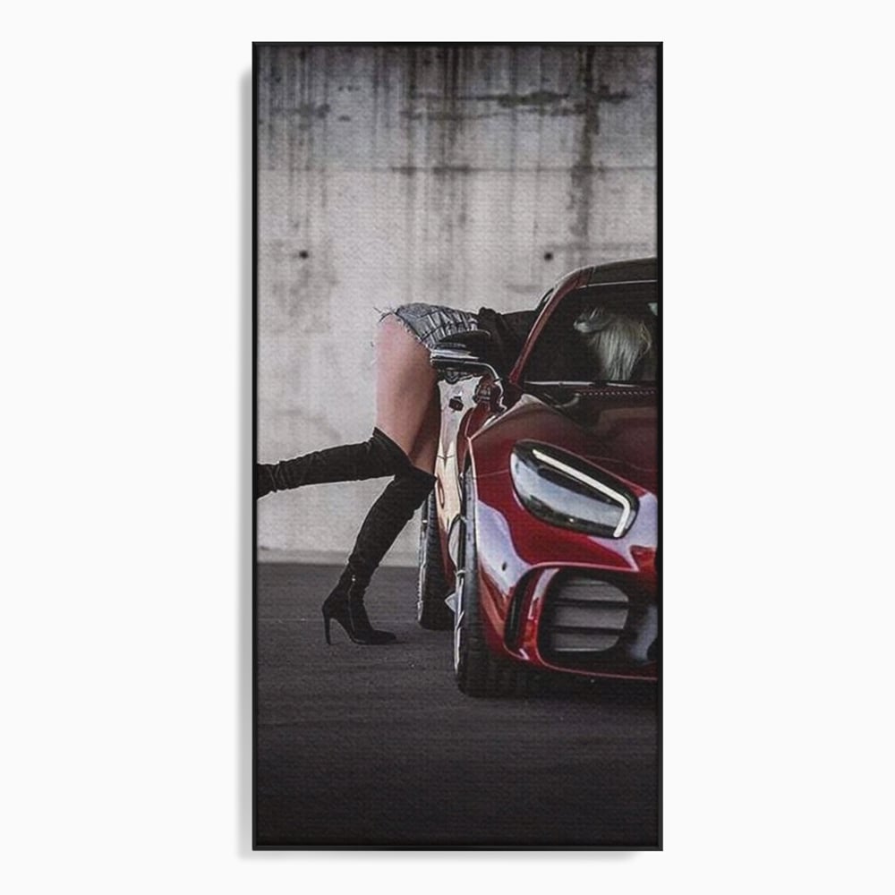 Tablou canvas cu femeie langa masina rosie, in rama de aluminiu negru