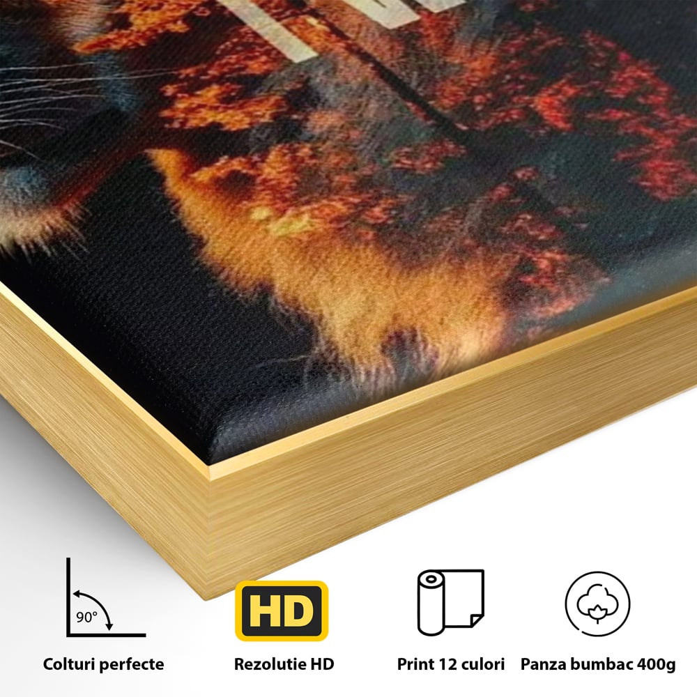 Detaliu al suprafetei: tablou canvas cu leu si padure aprinsa, in rama de aluminiu auriu