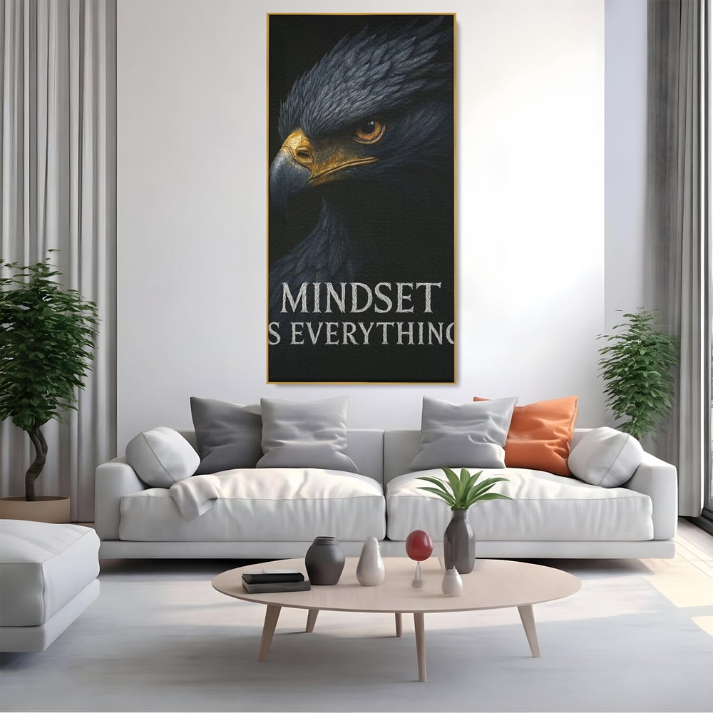 Tablou canvas cu tablou canvas cu vultur si mesaj, in rama de aluminiu auriu, pe perete intr-un living