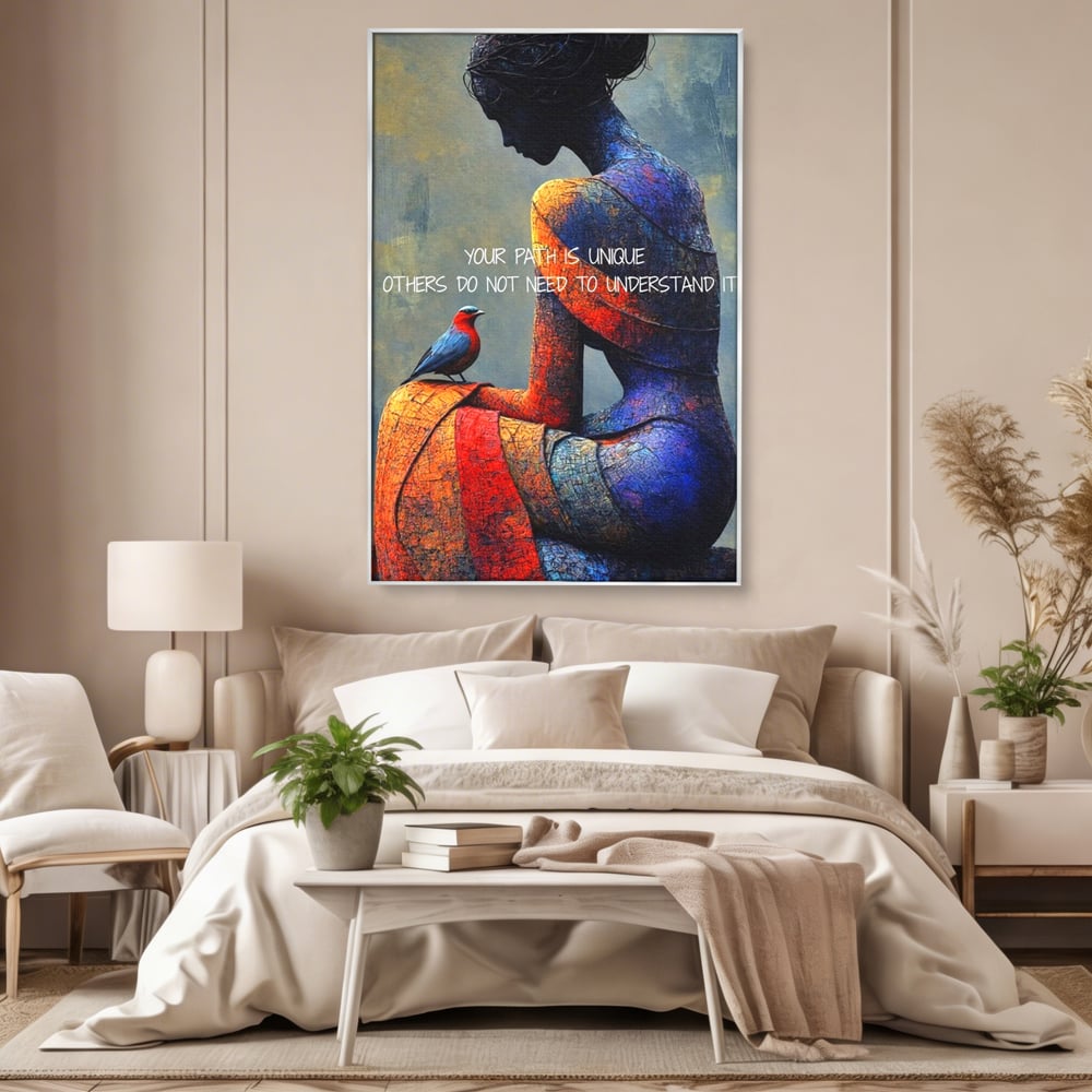 Tablou canvas cu tablou canvas cu femeie si pasare, in rama de aluminiu argintiu, pe perete intr-un dormitor
