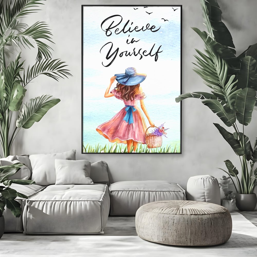 Tablou canvas cu ilustratie cu femeie si mesaj motivational, in rama de aluminiu negru, pe perete intr-un living