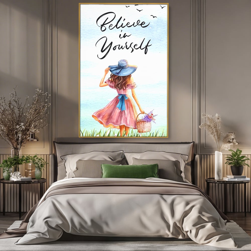 Tablou canvas cu ilustratie cu femeie si mesaj motivational, in rama de aluminiu auriu, pe perete intr-un dormitor