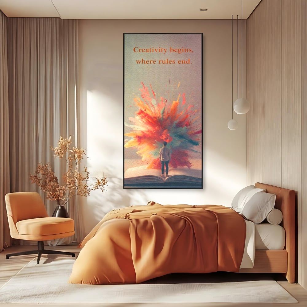 Tablou canvas cu tablou canvas cu barbat privind o explozie de culoare dintr-o carte deschisa, in rama de aluminiu negru, pe perete intr-un dormitor