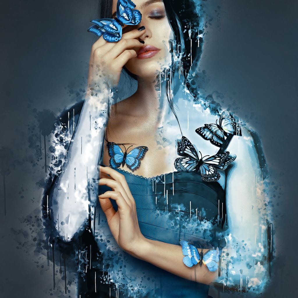 tablou canvas cu o femeie inconjurata de fluturi albastri, intr-o compozitie artistica in nuante reci