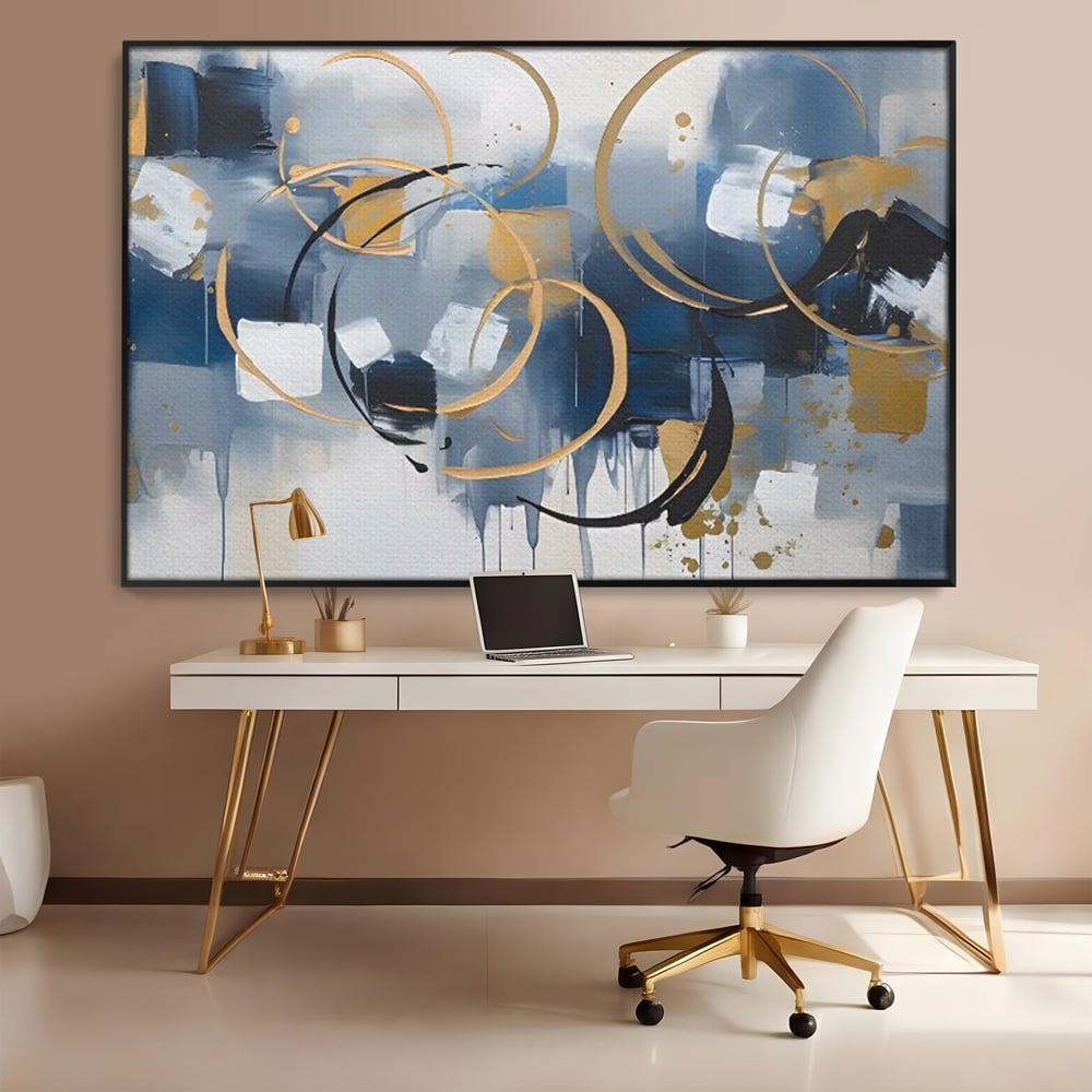 Tablou canvas cu pictura abstracta cu cercuri aurii si albastre, in rama de aluminiu negru, pe perete intr-un birou
