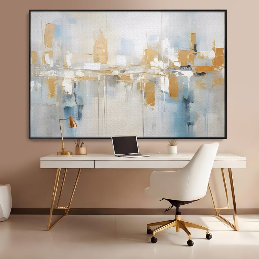 Tablou canvas cu pictura abstracta peisaj urban aurie si albastra, in rama de aluminiu negru, pe perete intr-un birou