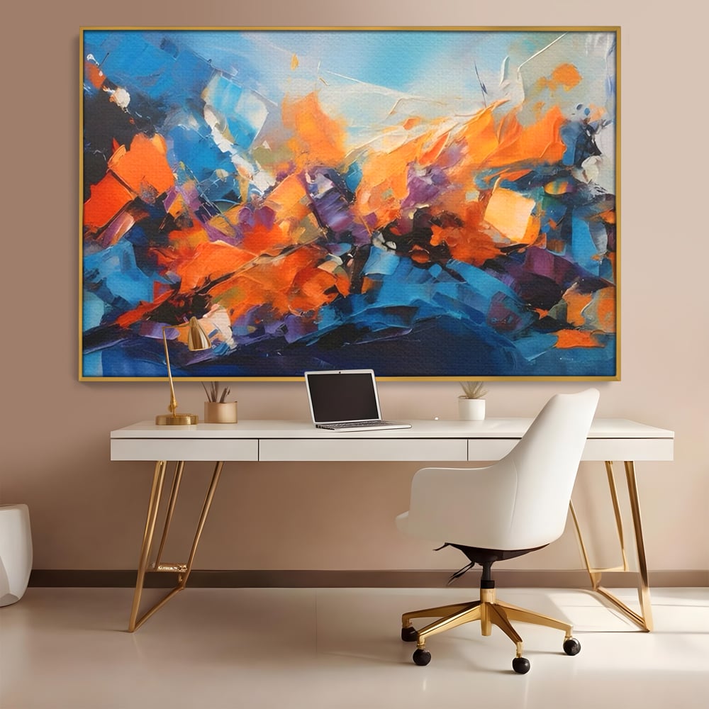 Tablou canvas cu pictura abstracta cu pete portocalii, in rama de aluminiu auriu, pe perete intr-un birou