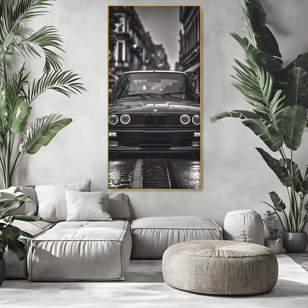Tablou canvas cu tablou canvas cu masina bmw clasica, in rama de aluminiu auriu, pe perete intr-un living