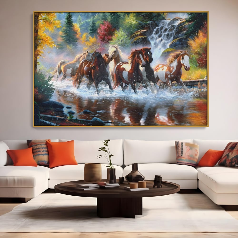 Tablou canvas cu tablou canvas cu cai galopand prin apa, in rama de aluminiu auriu, pe perete intr-un living