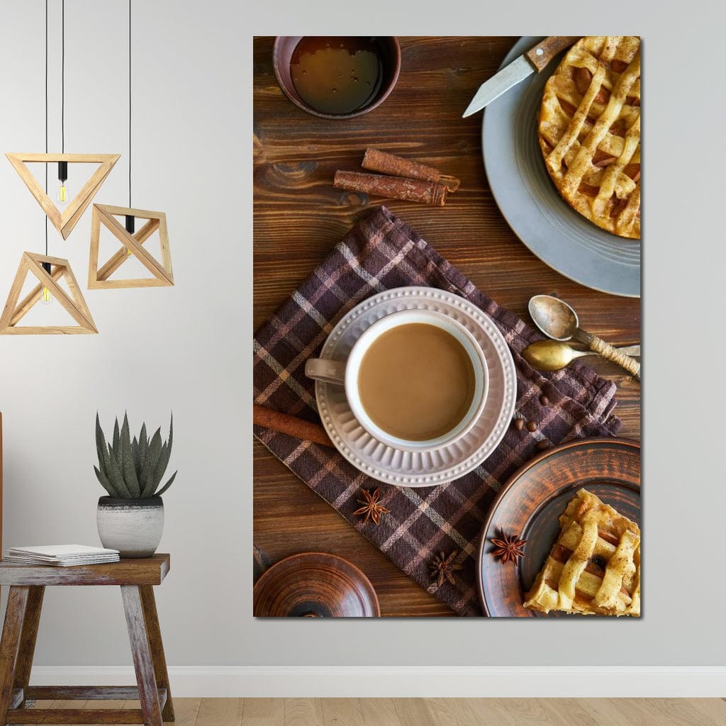 tablou canvas cu o ceasca de cafea, pe o masa de lemn cu farfurii cu placinta si tacamuri de mic dejun, intr-un cadru rustic 