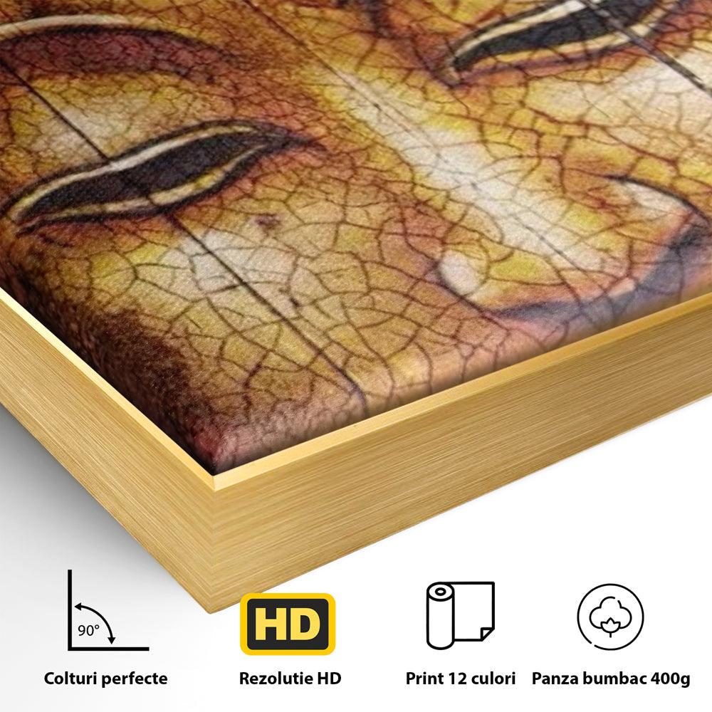 Detaliu al suprafetei: tablou canvas cu chipul lui buddha, in rama de aluminiu auriu