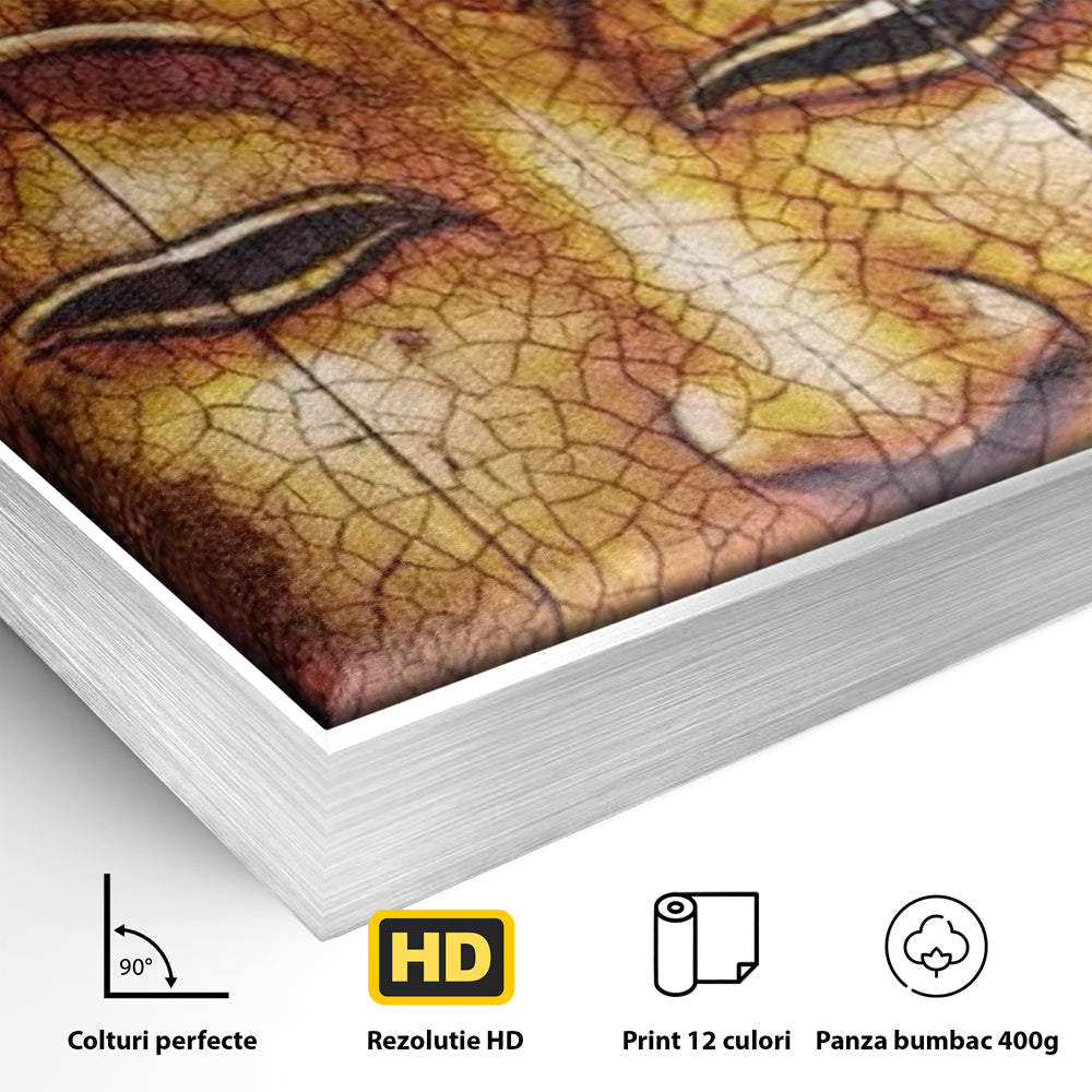 Detaliu al suprafetei: tablou canvas cu chipul lui buddha, in rama de aluminiu argintiu