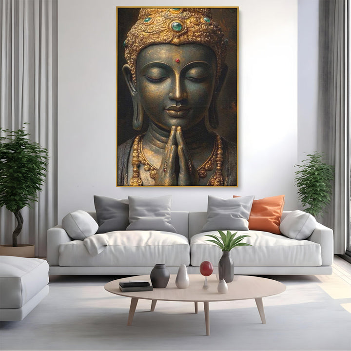 Tablou canvas cu tablou canvas cu buddha in rugaciune, in rama de aluminiu auriu, pe perete intr-un living
