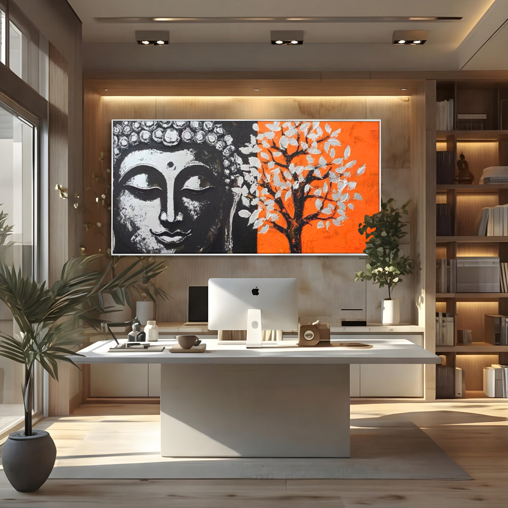 Tablou canvas cu tablou canvas cu capul lui buddha si un copac, in rama de aluminiu argintiu, pe perete intr-un birou